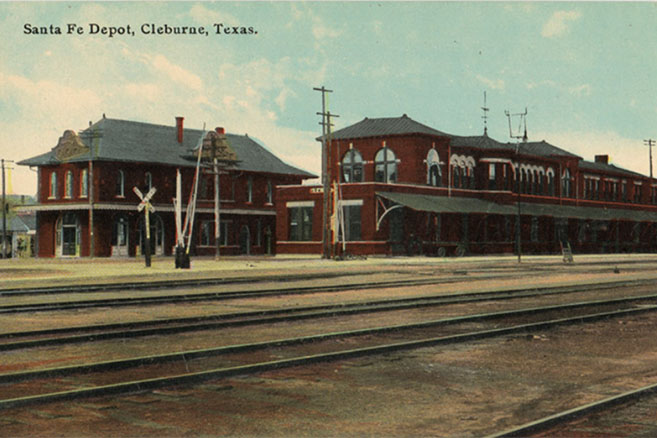 Trinity & Brazos Valley (left) and Santa Fe (right) depots in Cleburne c1910. The Santa Fe depot incorporated a Harvey House restaurant, which closed in 1931