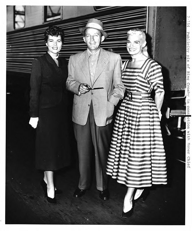 Bing Crosby, center, in front of the Super Chief